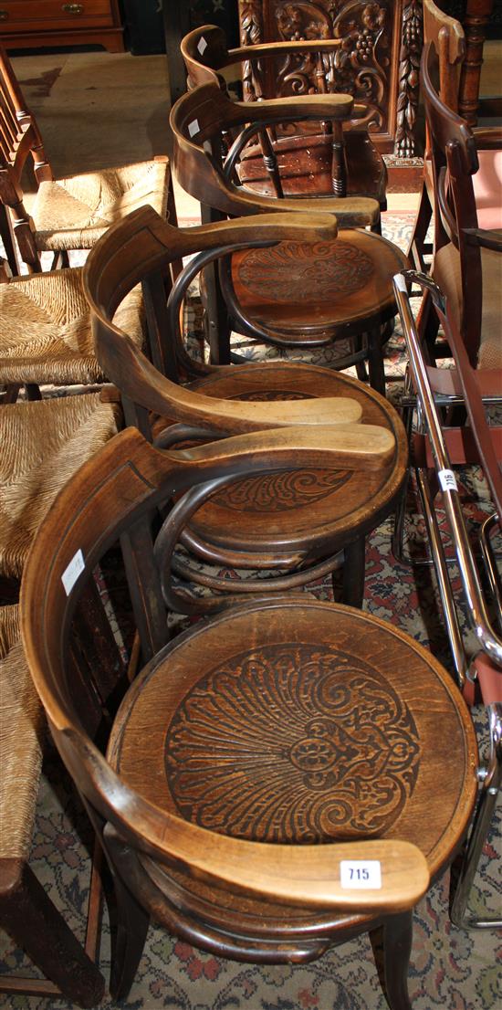 Three bentwood elbow chairs & another